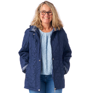 Quiltet jakke fra Saturne med aftagelig hætte